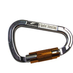 Close-up of a silver carabiner with an orange locking mechanism and engraved branding on the top bar.