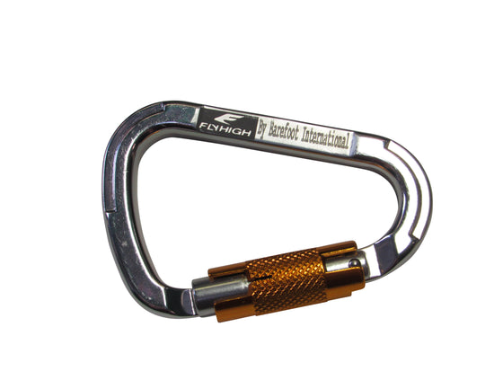 Close-up of a silver carabiner with an orange locking mechanism and engraved branding on the top bar.