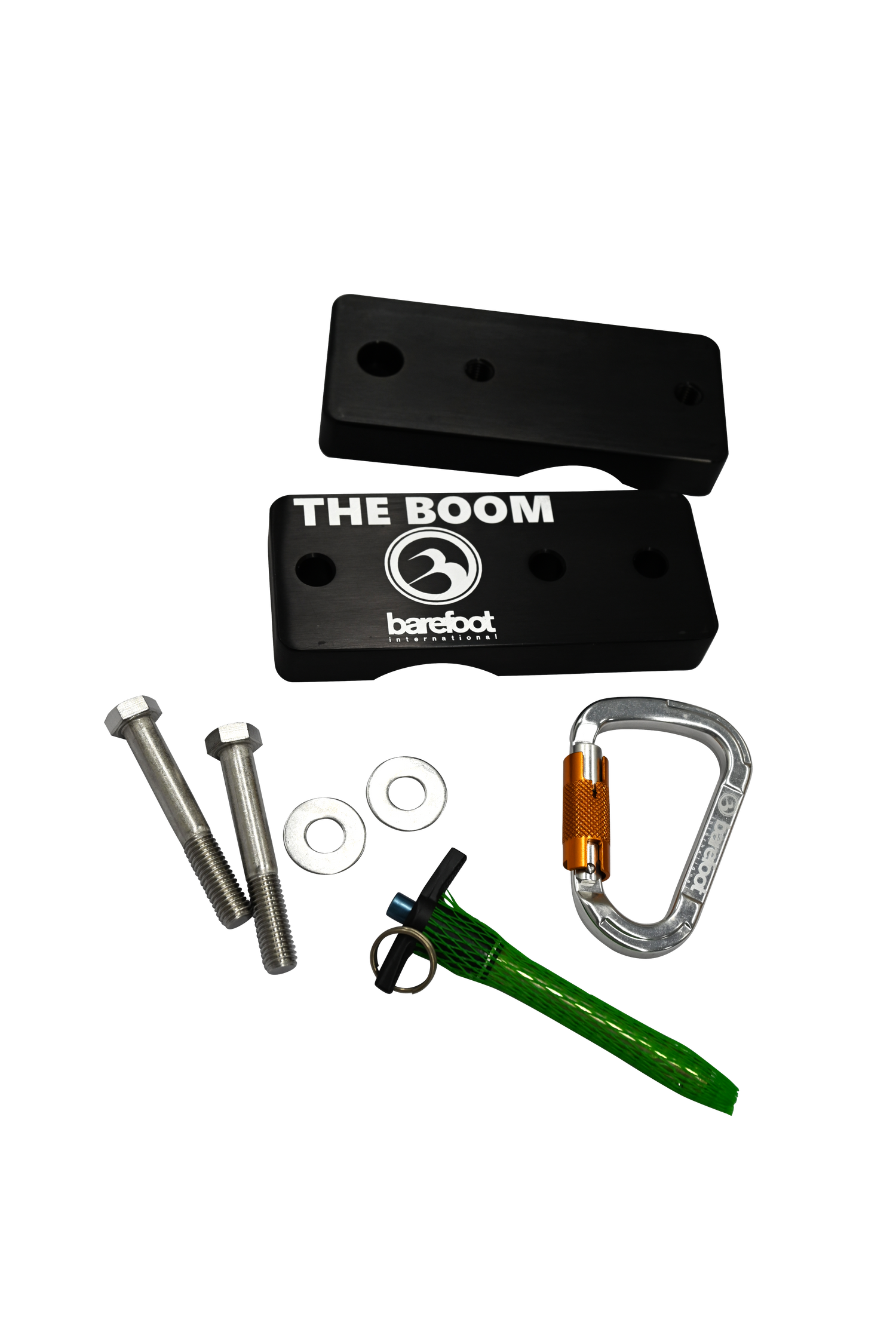 A top-view of a boom clamp box kit, including black metal plates, a green quick-release pin, a silver carabiner, and bolts.