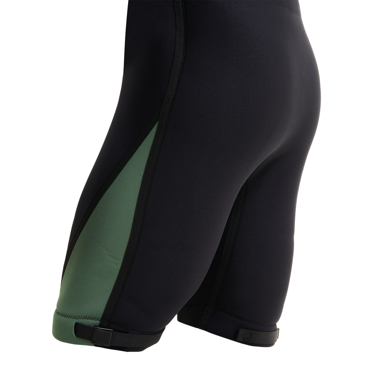 Close-up of the leg, green side paneling and strap on the Iron Short Sleeve Wetsuit.