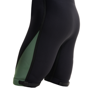 Close-up of the leg, green side paneling and strap on the Iron Short Sleeve Wetsuit.