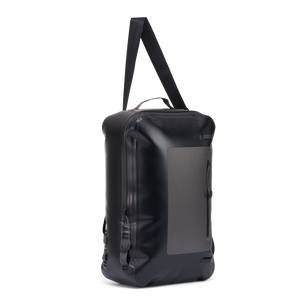Angled side view of Day Pack highlighting attachment loops and durable black shell.