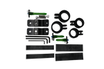 Close-up of Tower Boom clamp kit with black brackets, green pins, bolts, and a silver tube insert.
