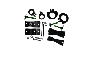 Top view of Tower Boom hardware kit with black brackets, green pins, wrenches, and rubber strips.