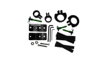 Top view of the Tower Boom Clamp Box hardware kit with black brackets, green pins, circular clamps, bolts, and rubber strips.