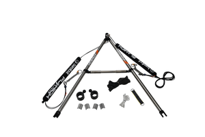 Disassembled Pro X Series Tower Extension with stainless steel poles, clamps, padding, and hardware laid out.