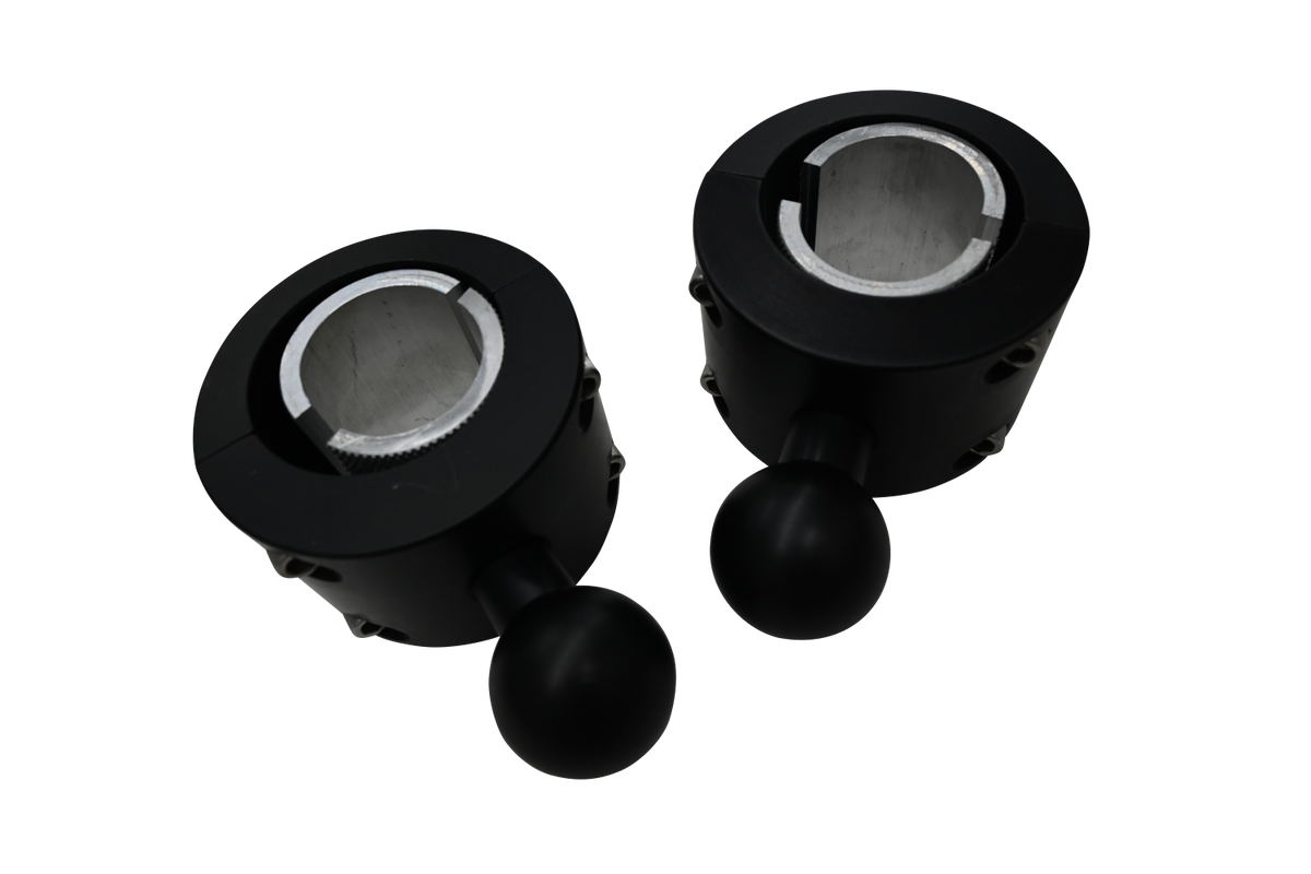 Angled view of two black aluminum clamp brackets with silver interior lining and secure fasteners.