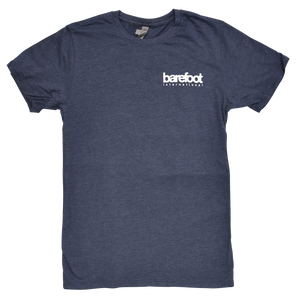Barefoot Logo Tee in navy blue with a small white Barefoot International logo on the left chest.