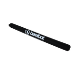 Side view of the Cable Protector & Shock Tube, showcasing its cylindrical shape with a black exterior and white branding.