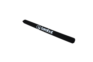 Side view of the Cable Protector & Shock Tube, showcasing its cylindrical shape with a black exterior and white branding.