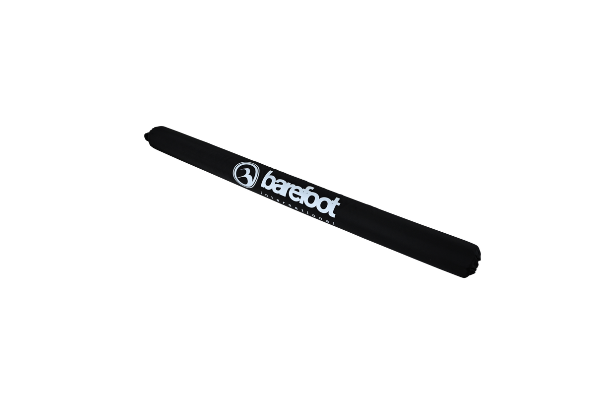 Side view of the Cable Protector & Shock Tube, showcasing its cylindrical shape with a black exterior and white branding.