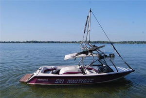 Side view of Pro X Series Tower Extension on boat tower over calm water.