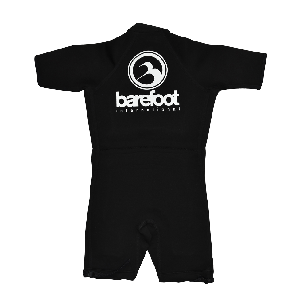 Back view of a black short-sleeve wetsuit with a large white Barefoot International logo on the upper back.